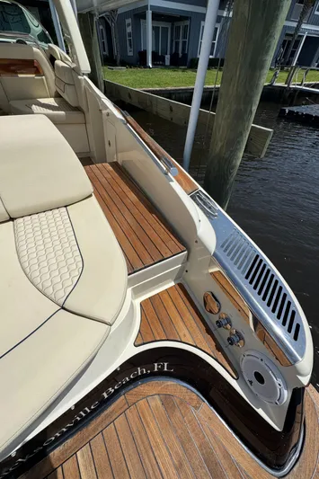  Yacht Photos Pics 2020 Chris-Craft Launch 31 GT boat with elegant seating and wooden deck details.