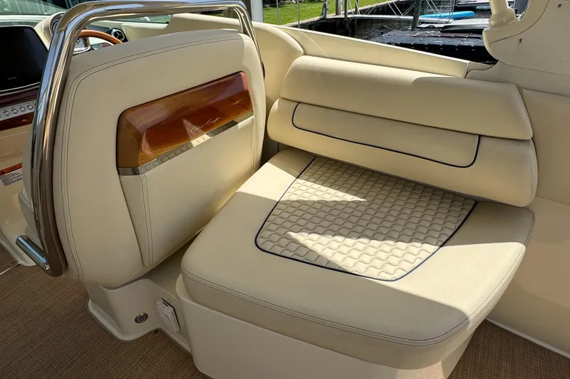  Yacht Photos Pics 2020 Chris-Craft Launch 31 GT interior with luxurious cream seating and elegant wood accents.