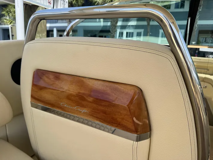  Yacht Photos Pics 2020 Chris-Craft Launch 31 GT boat seat with elegant wood and metal detailing.