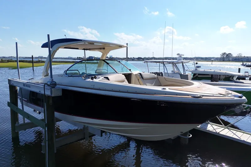  Yacht Photos Pics 2020 Chris-Craft Launch 31 GT boat docked on a sunny day.