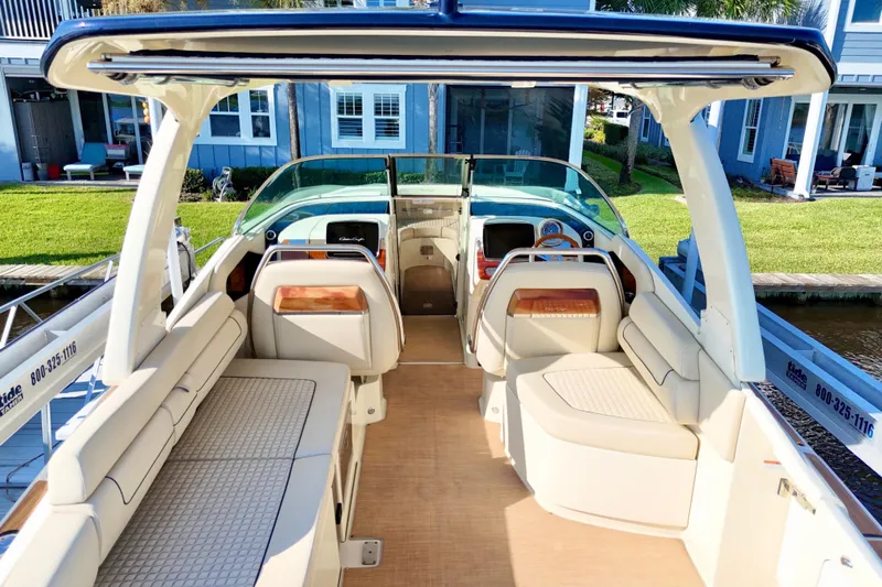  Yacht Photos Pics 2020 Chris-Craft Launch 31 GT boat interior with luxurious seating and helm.