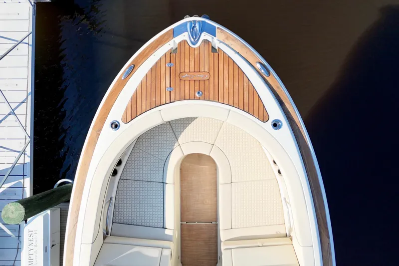  Yacht Photos Pics 2020 Chris-Craft Launch 31 GT boat, aerial view of bow with wooden deck.