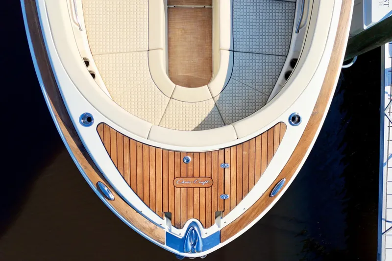  Yacht Photos Pics 2020 Chris-Craft Launch 31 GT boat, top view, featuring elegant wood and cushioned seating.