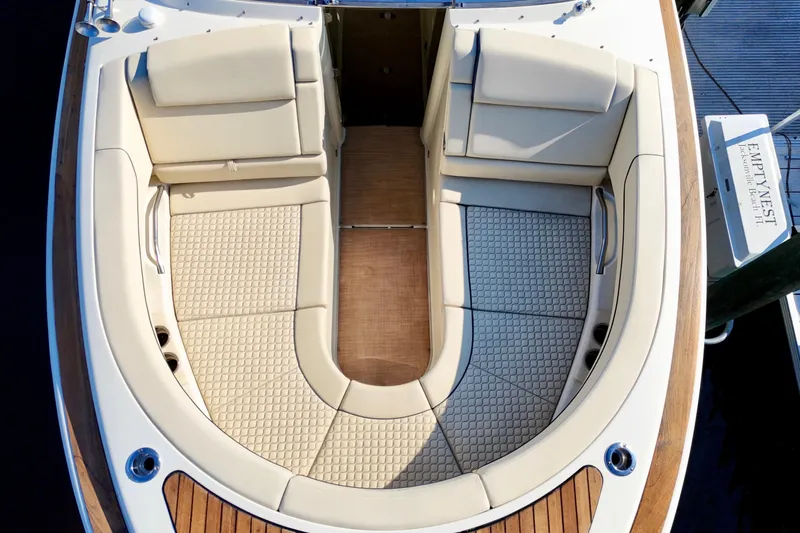  Yacht Photos Pics 2020 Chris-Craft Launch 31 GT boat with luxurious beige seating and wood accents.