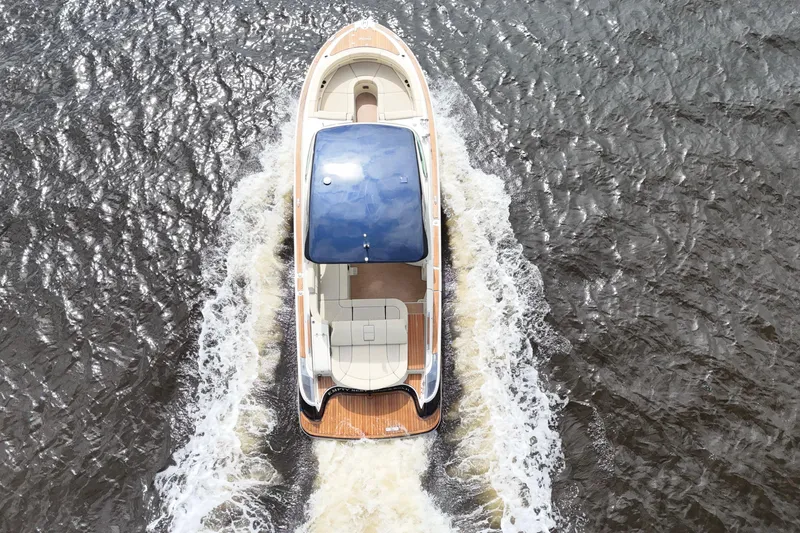  Yacht Photos Pics Overhead view of 2020 Chris-Craft Launch 31 GT cruising on water.