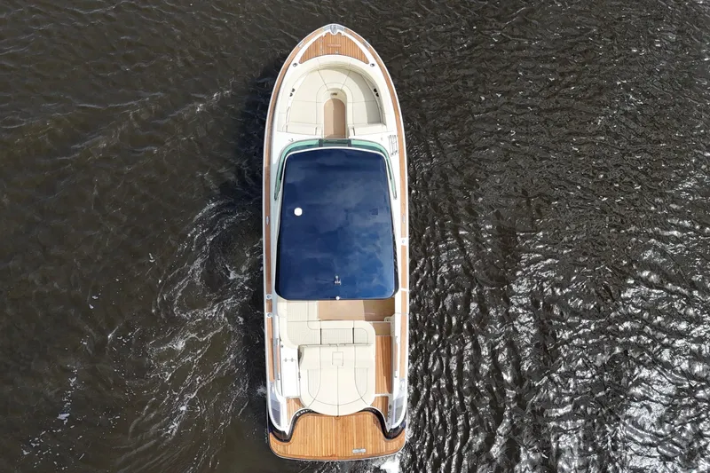  Yacht Photos Pics 2020 Chris-Craft Launch 31 GT boat on water, aerial view.
