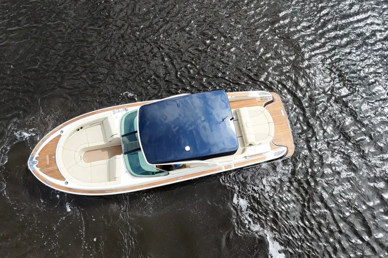  Yacht Photos Pics 2020 Chris-Craft Launch 31 GT boat on water, aerial view.