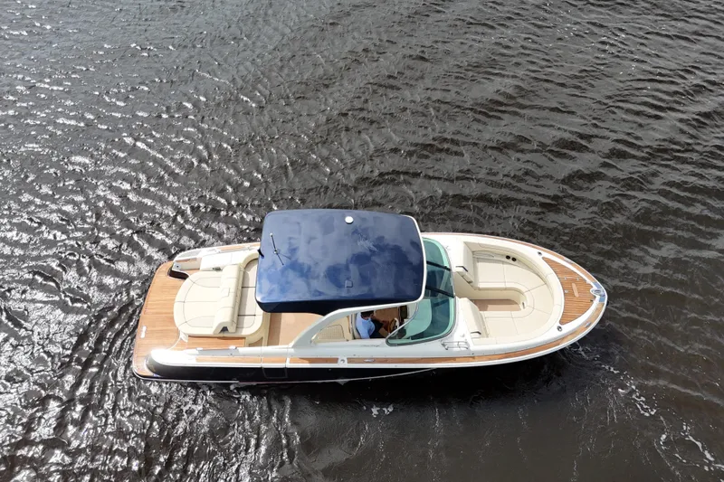  Yacht Photos Pics 2020 Chris-Craft Launch 31 GT boat on water, aerial view.
