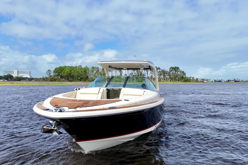  Yacht Photos Pics 2020 Chris-Craft Launch 31 GT boat on water, clear sky background.