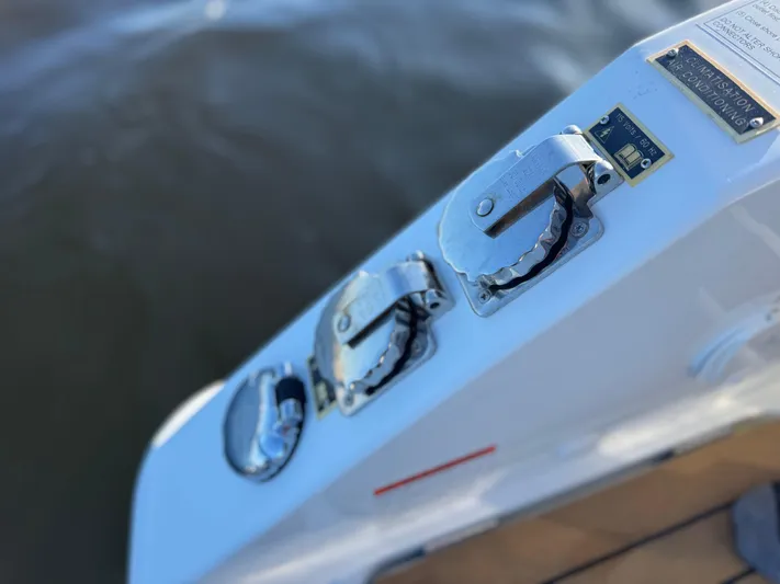 Make It Happen Yacht Photos Pics Jeanneau Leader 9.0 WA 2022 boat fuel caps on deck by water.