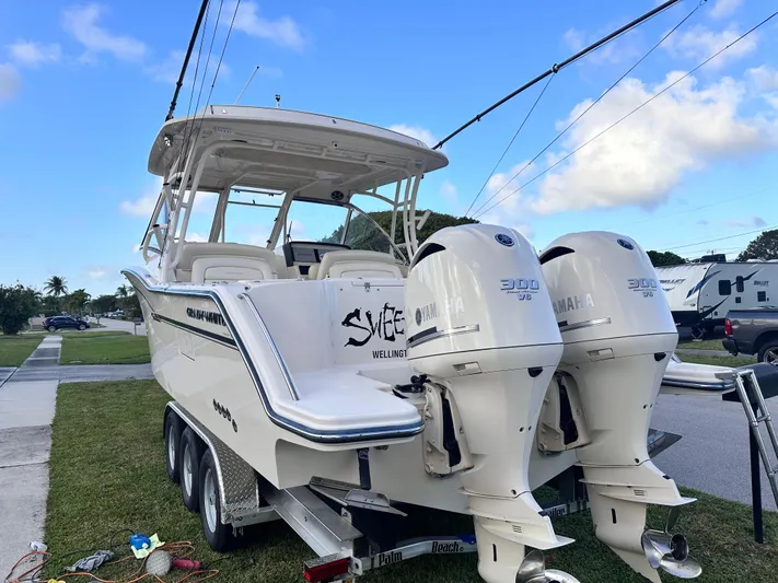 Sweet Life Yacht Photos Pics 2019 Grady-White Freedom 325 boat with twin Yamaha engines on a trailer.