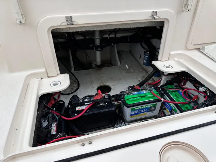 Sweet Life Yacht Photos Pics 2019 Grady-White Freedom 325 boat battery compartment with wiring and deep cycle batteries.