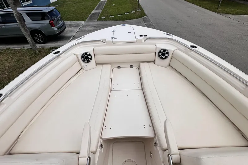 Sweet Life Yacht Photos Pics 2019 Grady-White Freedom 325 boat with spacious seating and sleek design.