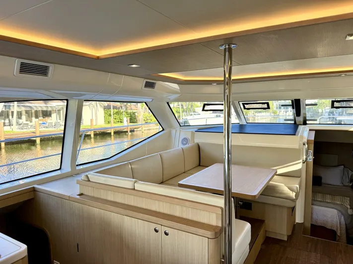 Roosterfish Yacht Photos Pics Luxurious interior of 2022 Aquila 44 yacht with spacious seating and modern design.