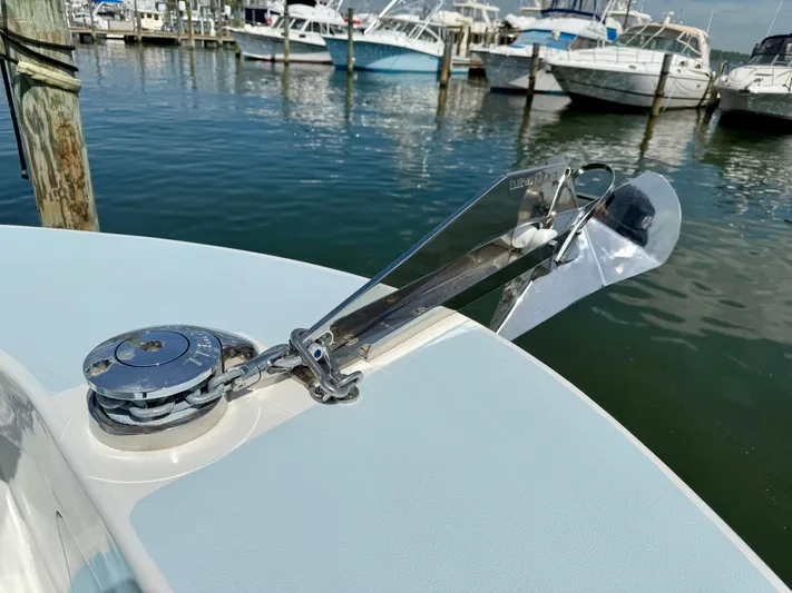 Reel Conversation Yacht Photos Pics 2023 Millennium Marine NuWave 37 boat anchor system at marina dock.