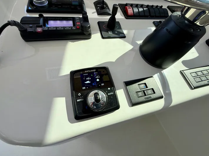 Reel Conversation Yacht Photos Pics Control panel of 2023 Millennium Marine NuWave 37 boat with navigation and communication devices.
