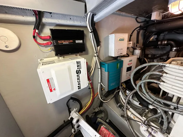  Yacht Photos Pics Engine room of 2004 Meridian 580 Pilothouse with electrical components and wiring.