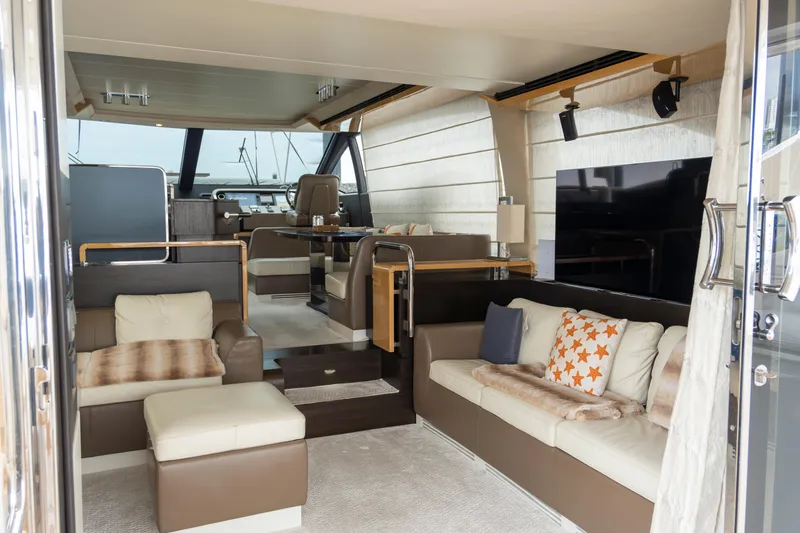  Yacht Photos Pics Luxurious interior of 2017 Azimut 66 FLY yacht with modern seating and elegant decor.