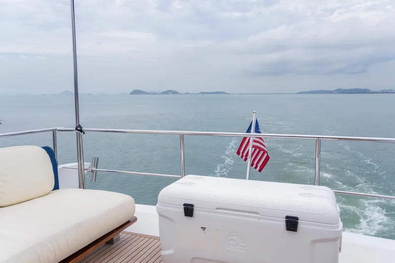  Yacht Photos Pics Luxurious 2017 Azimut 66 FLY yacht deck with ocean view and American flag.