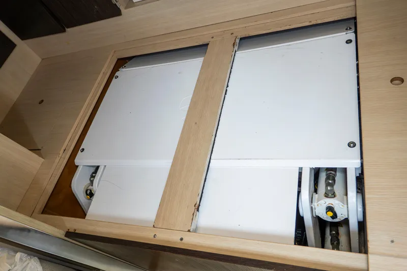  Yacht Photos Pics Engine compartment of 2017 Azimut 66 FLY yacht, showcasing mechanical components.