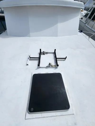  Yacht Photos Pics 1980 Tuna Rose Brothers boat deck with hatch and metal frame.