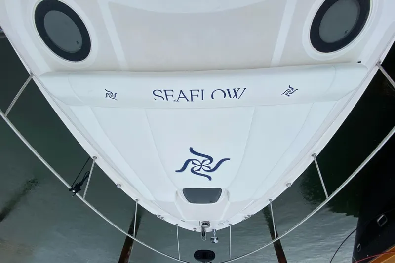  Yacht Photos Pics 2004 Sea Ray 340 Sundancer boat, top view, docked with "SEAFLOW" branding.