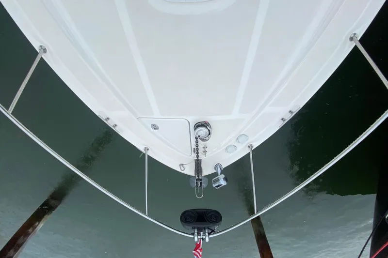  Yacht Photos Pics Top view of 2004 Sea Ray 340 Sundancer boat bow with anchor and railing.