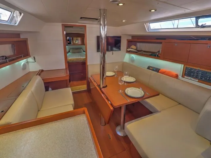 Sv Tonic III Yacht Photos Pics Interior of 2012 Beneteau Oceanis 41.1 yacht with dining area and modern furnishings.