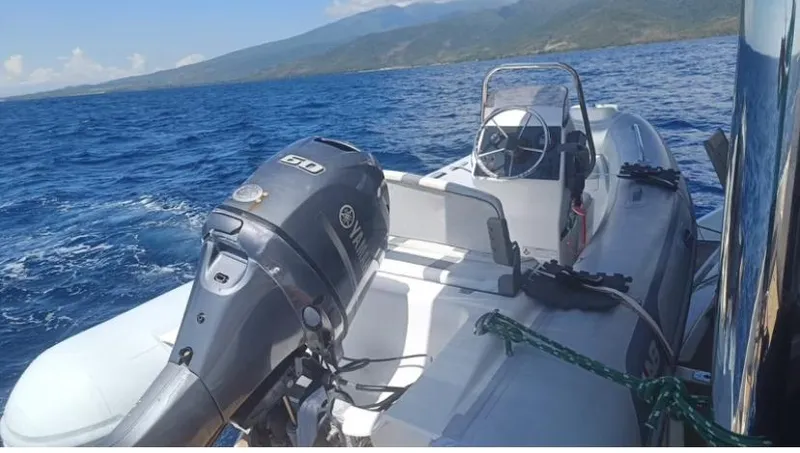 Oe Hani Yacht Photos Pics Inflatable boat with Yamaha motor on open sea, Leopard 58 model, 2018.