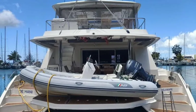 Oe Hani Yacht Photos Pics Luxury Leopard 58 yacht with tender boat docked at marina, 2018 model.