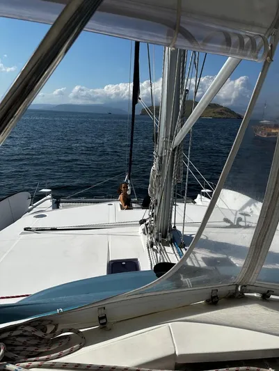 Oe Hani Yacht Photos Pics Sailing on a 2018 Leopard 58 catamaran with ocean and island views.