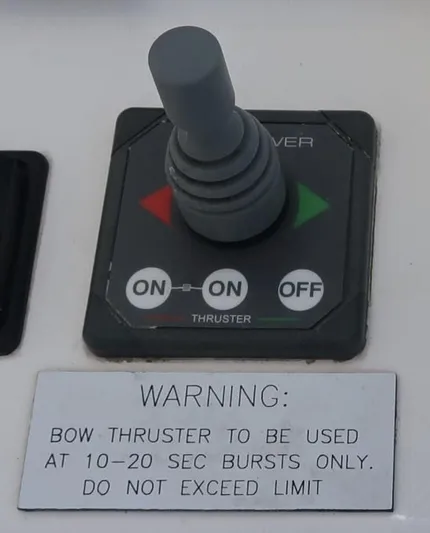 Oe Hani Yacht Photos Pics Control panel with joystick and warning for bow thruster usage on Leopard 58 yacht.