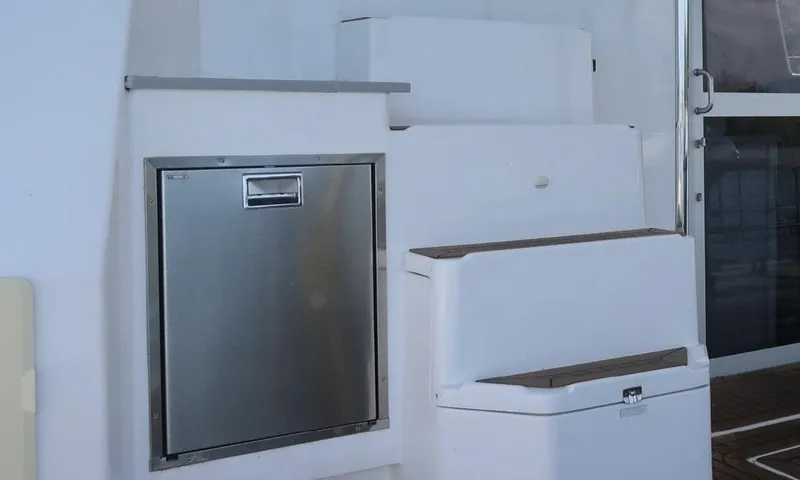 Oe Hani Yacht Photos Pics Stainless steel appliance on Leopard 58 yacht, 2018 model, with white cabinetry.