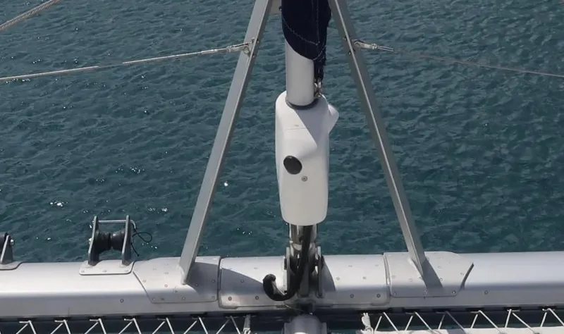 Oe Hani Yacht Photos Pics Sailing yacht Leopard 58, 2018 model, mast and rigging over blue ocean water.