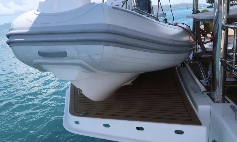 Oe Hani Yacht Photos Pics Inflatable boat on Leopard 58 yacht deck, 2018 model, with ocean backdrop.