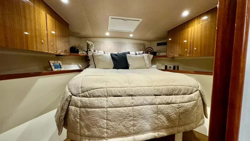  Yacht Photos Pics Interior of a 2012 Viking 42 Open yacht with cozy bedroom.
