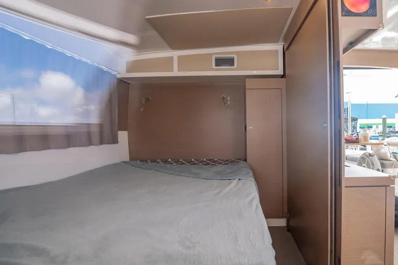 Big Bird Yacht Photos Pics Interior cabin of 2021 NEEL 47 with bed and window view.