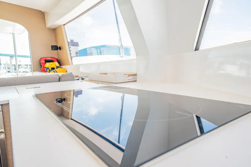 Big Bird Yacht Photos Pics Modern kitchen interior on 2021 NEEL 47 yacht with sleek induction cooktop.