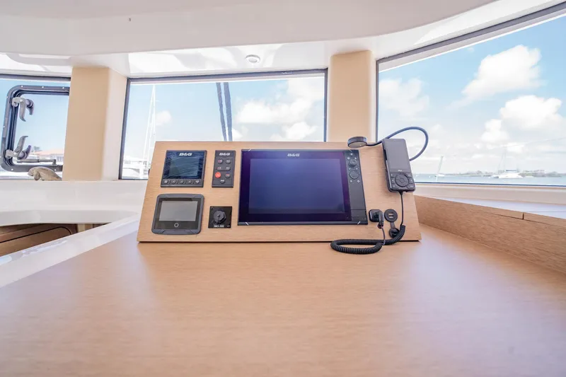 Big Bird Yacht Photos Pics Navigation console on NEEL 47 trimaran, 2021 model, with electronic displays and controls.