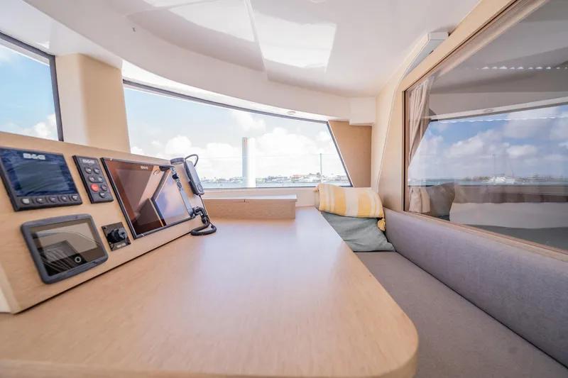 Big Bird Yacht Photos Pics Interior of 2021 NEEL 47 yacht with navigation equipment and seating area.