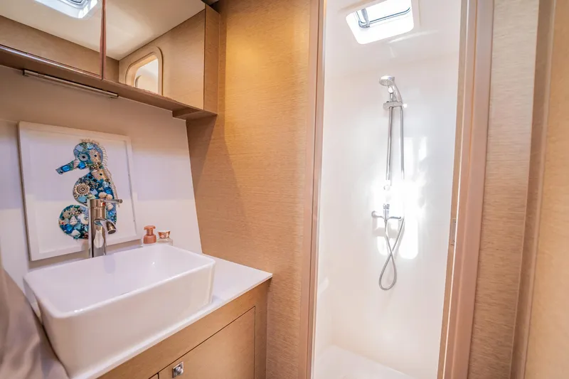 Big Bird Yacht Photos Pics Modern bathroom interior on 2021 NEEL 47 yacht with sink and shower.