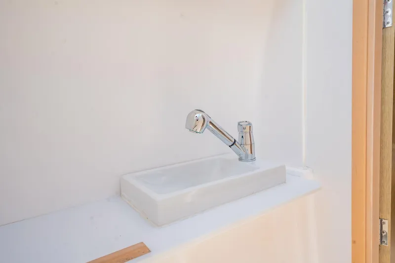 Big Bird Yacht Photos Pics Modern sink with chrome faucet in NEEL 47, 2021 model.