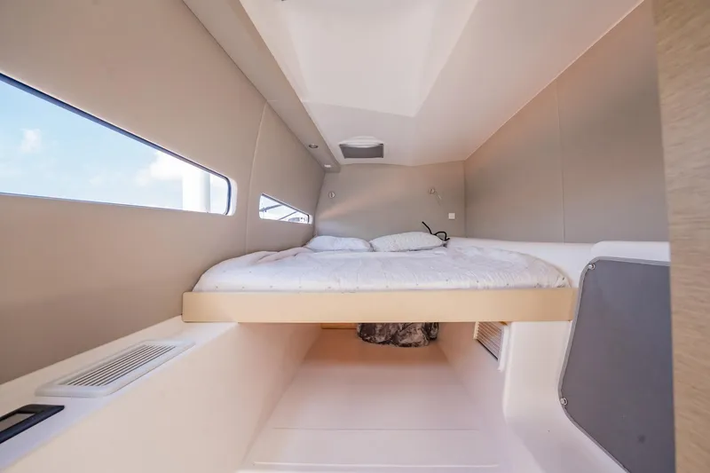 Big Bird Yacht Photos Pics Interior cabin of 2021 NEEL 47, featuring a cozy bed and modern design.