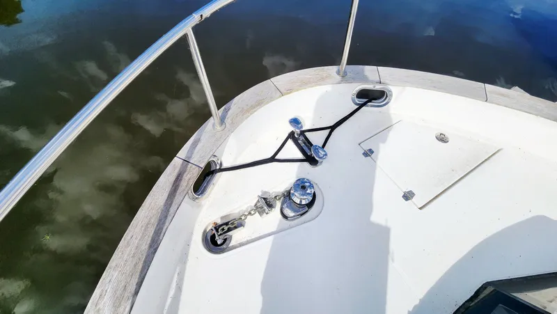 Sea-solar Sue & Lectric Lee Yacht Photos Pics Bow of 2022 Greenline 40 yacht with anchor and railing details.