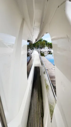 Sea-solar Sue & Lectric Lee Yacht Photos Pics Side view of 2022 Greenline 40 yacht docked at marina.