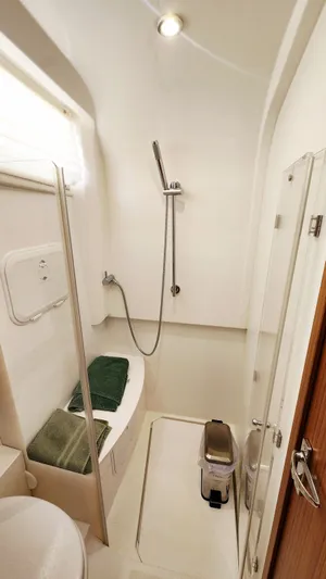 Sea-solar Sue & Lectric Lee Yacht Photos Pics Modern bathroom in 2022 Greenline 40 yacht with shower and sleek design.