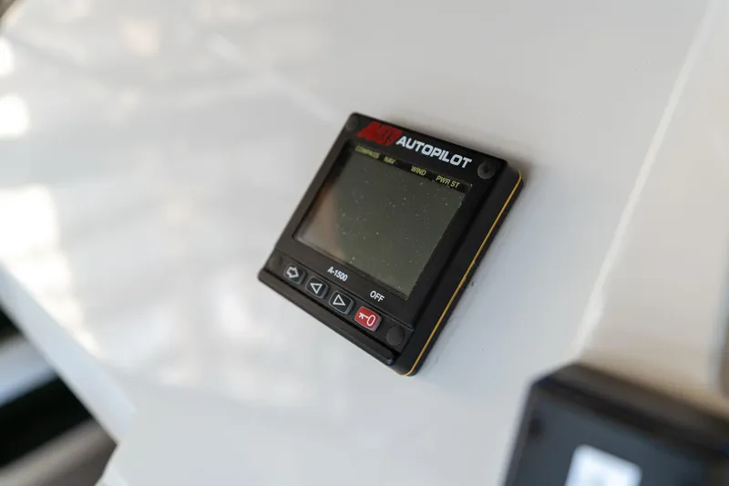 Shore Leave Yacht Photos Pics Autopilot control panel on 1998 Carver 355 Aft Cabin yacht dashboard.