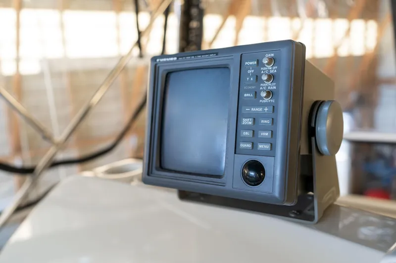 Shore Leave Yacht Photos Pics 1998 Carver 355 Aft Cabin boat navigation system with control panel and display screen.