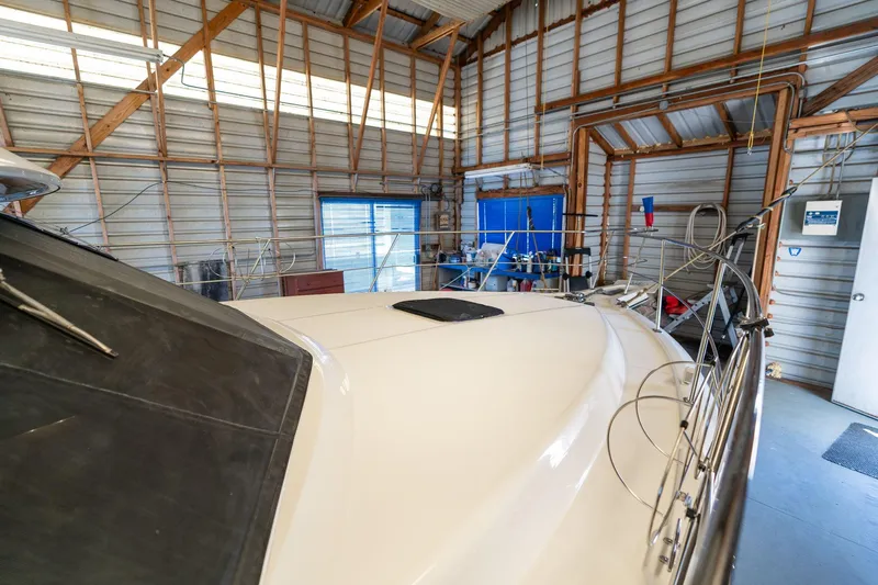 Shore Leave Yacht Photos Pics 1998 Carver 355 Aft Cabin yacht in a spacious indoor storage facility.