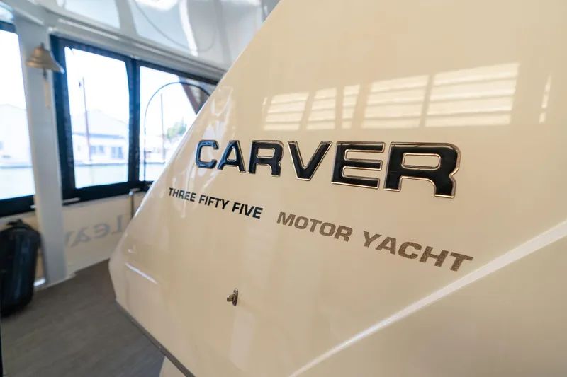 Shore Leave Yacht Photos Pics 1998 Carver 355 Aft Cabin Motor Yacht interior with logo detail.